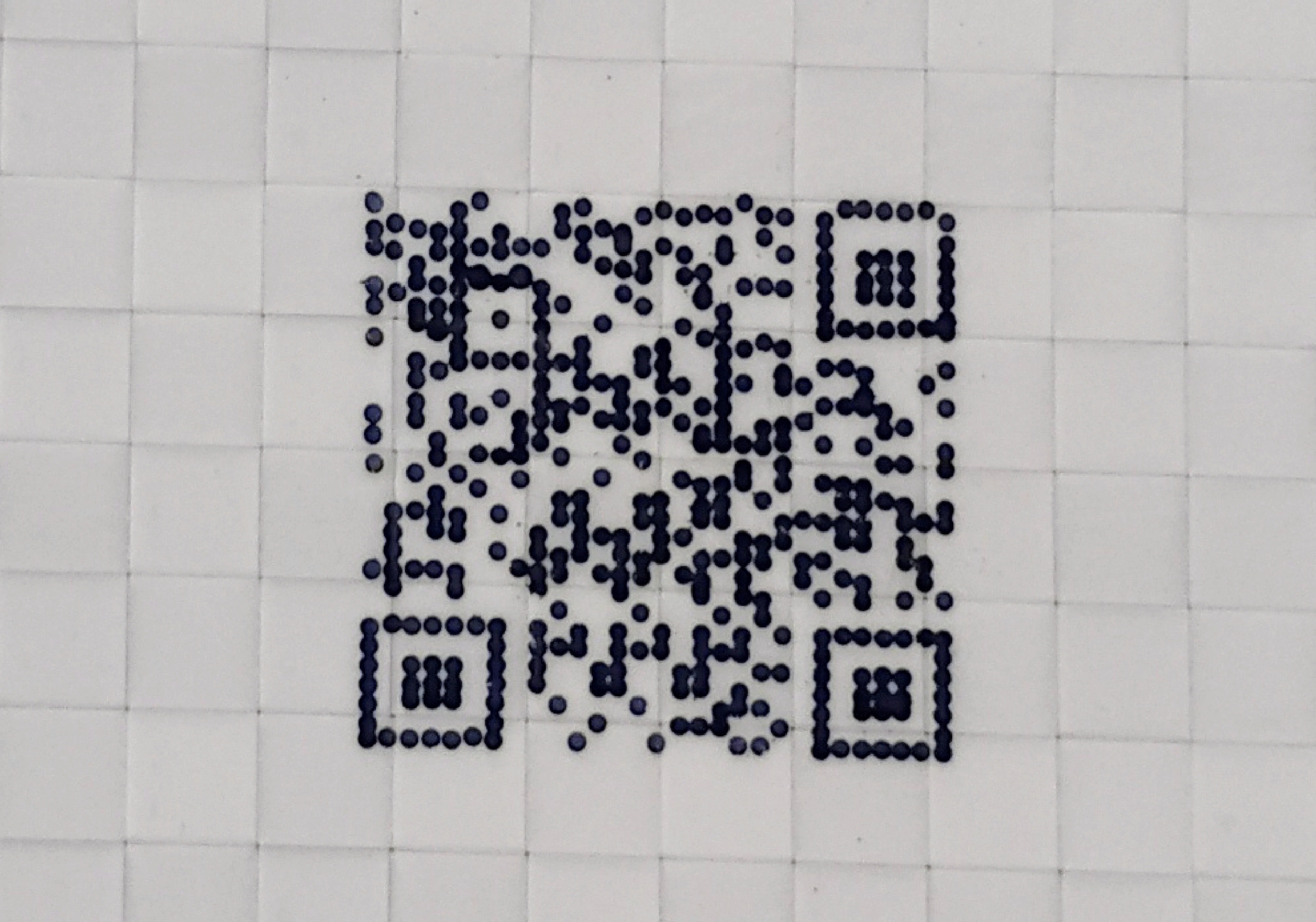 QR code being scanned by smartphone